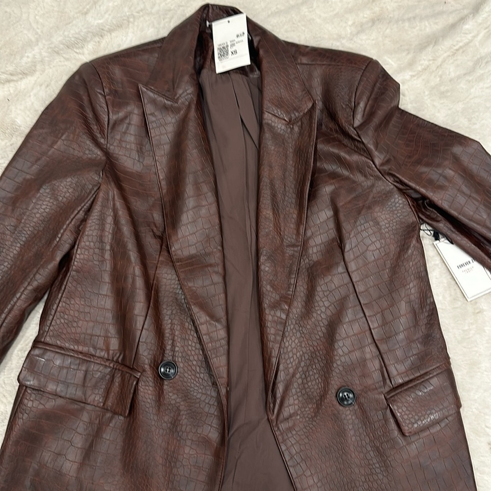Brand new faux leather blazer